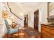 Elegant foyer with hardwood floors and a staircase at 2980 Bakers Meadow Se Ln, Atlanta, GA 30339