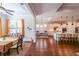 Open-concept living area featuring hardwood floors, recessed lighting, and seamless transition into the kitchen at 307 Serenity Way, Woodstock, GA 30188