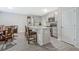 Open kitchen featuring granite countertops, stainless appliances, and a breakfast bar at 370 Cassidy Trl, Douglasville, GA 30134