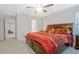 This spacious main bedroom offers plush bedding and ample natural light, creating a serene atmosphere at 370 Cassidy Trl, Douglasville, GA 30134