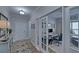 Inviting entryway offering views of the adjacent study with french doors and light-filled rooms at 5719 Sierra Bend Way, Hoschton, GA 30548