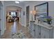 Grand entryway featuring hardwood floors, an art niche, and easy access to the living area at 5719 Sierra Bend Way, Hoschton, GA 30548