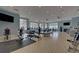 A modern gym equipped with a variety of machines and equipment for a comprehensive fitness routine at 5719 Sierra Bend Way, Hoschton, GA 30548