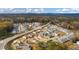 Aerial view of new construction community with manicured landscapes and well-planned street layout at 213 Saratoga Dr, Acworth, GA 30102