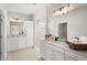 Bright bathroom featuring double vanity with marble countertops and ample storage at 213 Saratoga Dr, Acworth, GA 30102