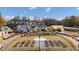 Charming community garden with raised beds, set amongst new homes and professional landscaping at 213 Saratoga Dr, Acworth, GA 30102