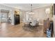 Inviting dining area featuring hardwood floors and a stylish round table at 2975 Thistle Trl, Suwanee, GA 30024