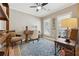 Bright home office featuring hardwood floors, neutral walls, and traditional furnishings at 2975 Thistle Trl, Suwanee, GA 30024