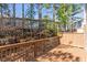 Spacious wooden back deck providing ample room for outdoor activities and relaxation at 4000 Howell Park Rd, Duluth, GA 30096