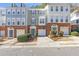 Charming townhomes featuring brick accents, attached garages, and well-maintained landscaping at 4000 Howell Park Rd, Duluth, GA 30096