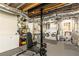 Functional basement space featuring laundry, work out equipment, and exposed ductwork at 57 Rumson Ne Way, Atlanta, GA 30305