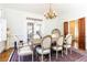 Spacious dining room featuring elegant decor and ample natural light at 57 Rumson Ne Way, Atlanta, GA 30305