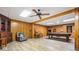 Spacious finished basement with seating area, pool table, arcade game, and display cabinet at 724 Laurel Chase Sw, Marietta, GA 30064