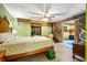 Bedroom with attached closet, wood flooring, and rustic wooden beams at 724 Laurel Chase Sw, Marietta, GA 30064