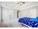 Large main bedroom with carpet flooring, trey ceiling, and natural light at 724 Laurel Chase Sw, Marietta, GA 30064