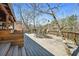 Wooden deck overlooking a picturesque landscape, complete with outdoor seating at 724 Laurel Chase Sw, Marietta, GA 30064