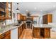 Charming kitchen with wood cabinets, granite countertops, and stainless steel appliances at 724 Laurel Chase Sw, Marietta, GA 30064