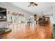 Spacious room featuring hardwood floors, fireplace, and an abundance of natural light at 724 Laurel Chase Sw, Marietta, GA 30064