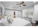 Large bedroom with modern decor and a view of the hallway and closet space at 1027 Mount Airy Sw Dr, Atlanta, GA 30311