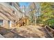 Exterior view of the backyard with wooden deck and lush greenery at 1883 Acuba Ln, Atlanta, GA 30345