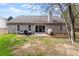 Exterior of home with large, fenced backyard and patio at 2405 Landrum Ct, Lawrenceville, GA 30043