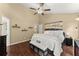 Spacious bedroom with vaulted ceilings and hardwood floors and ensuite bathroom at 2405 Landrum Ct, Lawrenceville, GA 30043