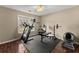 Home gym offers lots of natural light and is equipped with modern workout equipment at 2405 Landrum Ct, Lawrenceville, GA 30043