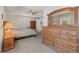 Serene main bedroom featuring a tray ceiling and comfortable furnishings at 2999 Paul Harris Rd, Dallas, GA 30157