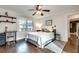 Bedroom features hardwood flooring, large window view, and great lighting throughout at 2031 Audubon Ne Dr, Atlanta, GA 30329