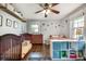 Bedroom with wood floors, space themed wall stickers, two beds and a storage unit with blue storage cubes at 2031 Audubon Ne Dr, Atlanta, GA 30329