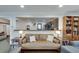 Living room with a pass-through to the kitchen, featuring hardwood floors and comfortable seating at 2031 Audubon Ne Dr, Atlanta, GA 30329