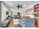 Bright living room with hardwood floors, modern furnishings, and a seamless flow to the dining area at 2031 Audubon Ne Dr, Atlanta, GA 30329