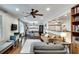 Spacious living room featuring hardwood floors, an open layout, and a seamless flow to the kitchen at 2031 Audubon Ne Dr, Atlanta, GA 30329