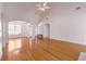 Spacious living room featuring hardwood floors, high ceilings, and abundant natural light at 2119 Willow Chase Ct, Tucker, GA 30084