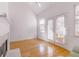 Living room featuring a fireplace and French doors to the outside at 2119 Willow Chase Ct, Tucker, GA 30084