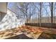 Backyard with bare trees, a concrete patio, and a wooden privacy fence, offering outdoor space at 3326 Waldrop Trl, Decatur, GA 30034