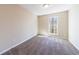 Cozy bedroom with neutral carpeting, a single window for natural light, and ample wall space at 3326 Waldrop Trl, Decatur, GA 30034