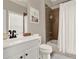 Cozy bathroom featuring a modern vanity, updated fixtures, and a shower/tub with tile surround and neutral tones at 103 Patrick Way, Marietta, GA 30064