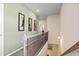 Upstairs hallway with neutral decor, soft carpet, and access to multiple rooms at 319 Skye Ln # 52, Cartersville, GA 30121