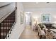 Sunlit living room featuring hardwood floors, a staircase, and stylish furniture at 319 Skye Ln # 52, Cartersville, GA 30121