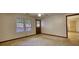 This room features carpet and a fan at 5500 Rockbridge Road, Stone Mountain, GA 30088