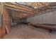 A spacious basement with exposed wood and ductwork, offering ample potential for customization and additional living space at 108 Jasmine Way, Villa Rica, GA 30180