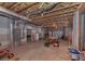 Partially finished basement with exposed ductwork and utilities, offering potential for expansion and customization at 108 Jasmine Way, Villa Rica, GA 30180