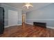 Bedroom with hardwood floors and soft blue walls at 108 Jasmine Way, Villa Rica, GA 30180