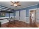 Bedroom featuring a lofted bed, hardwood flooring, and natural light at 108 Jasmine Way, Villa Rica, GA 30180