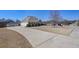 Brick home with a lush lawn, a circular driveway, and a well-maintained landscape on a sunny day at 108 Jasmine Way, Villa Rica, GA 30180