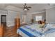 Main bedroom featuring hardwood floors and a tray ceiling at 108 Jasmine Way, Villa Rica, GA 30180