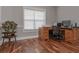 Bright office features hardwood floors and a large window for lots of natural light at 108 Jasmine Way, Villa Rica, GA 30180