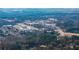 Aerial view showcasing residential areas in proximity to business and retail at 1558 Autumn Wood Trl, Sugar Hill, GA 30518