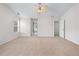 Large main bedroom features multiple closets and carpeted flooring at 1558 Autumn Wood Trl, Sugar Hill, GA 30518